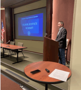Montana Attorney General Austin Knudsen presenting to a crowd.